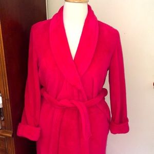Delicates. Size large. Long red colored bathrobe.